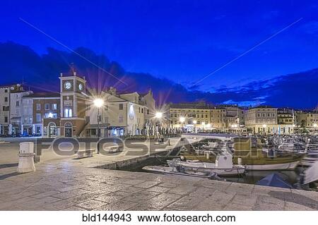 Illuminated waterfront promenade and dock at night, Rovinj, Istria, Croatia View Large Photo Image Stock Image - Illuminated waterfront promenade and dock at night, Rovinj, Istria, Croatia. Fotosearch