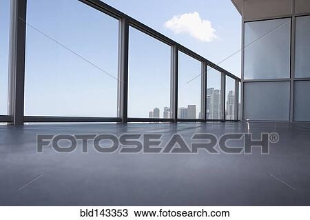 Low angle view of apartment balcony overlooking cityscape View Large Photo Image Stock Image - Low angle view of apartment balcony overlooking cityscape. Fotosearch