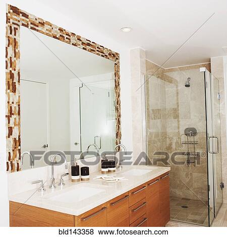 Mirror, sinks and shower in modern bathroom View Large Photo Image Stock Photo - Mirror, sinks and shower in modern bathroom. Fotosearch