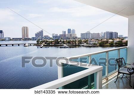 Modern balcony overlooking city skyline, Miami, Florida, United States View Large Photo Image Stock Photography - Modern balcony overlooking city skyline, Miami, Florida, United States. Fotosearch