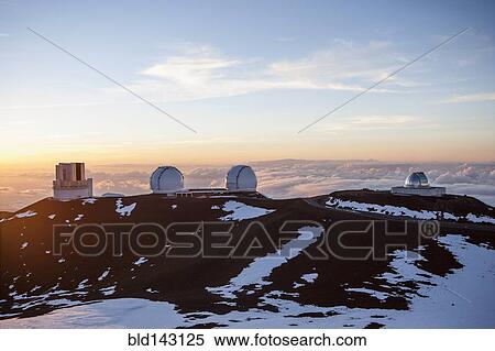 Stock Photography - Observatory and silos on snowy mountaintop, Kilauea, Hawaii, United States. Fotosearch
