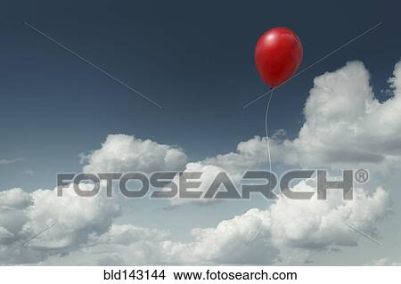 Red balloon floating in cloudy sky View Large Photo Image Picture - Red balloon floating in cloudy sky. Fotosearch