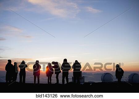 Silhouette of tourists admiring view from mountaintop, Kilauea, Hawaii, United States View Large Photo Image Stock Photograph - Silhouette of tourists admiring view from mountaintop, Kilauea, Hawaii, United States. Fotosearch