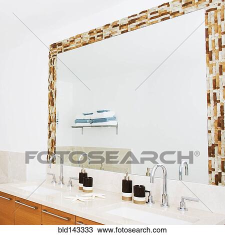 Sinks, countertop and mirror in modern bathroom View Large Photo Image Stock Image - Sinks, countertop and mirror in modern bathroom. Fotosearch
