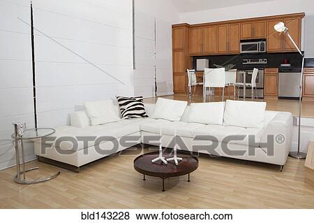 Stock Photo - Sofa and coffee table in modern living room. Fotosearch