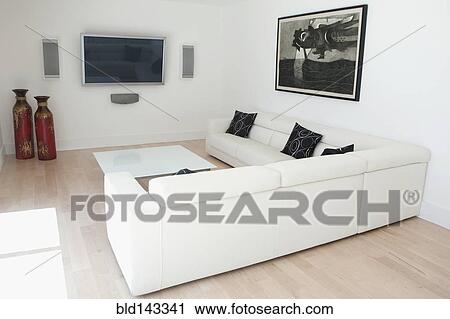 Stock Image - Sofas and coffee table in modern living room. Fotosearch
