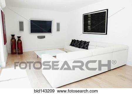 Sofas, television and wall art in modern living room View Large Photo Image Stock Photo - Sofas, television and wall art in modern living room. Fotosearch