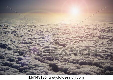 Sun shining in sky above clouds View Large Photo Image Stock Photography - Sun shining in sky above clouds. Fotosearch