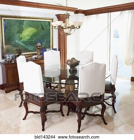 Table and chairs in ornate dining room View Large Photo Image Picture - Table and chairs in ornate dining room. Fotosearch