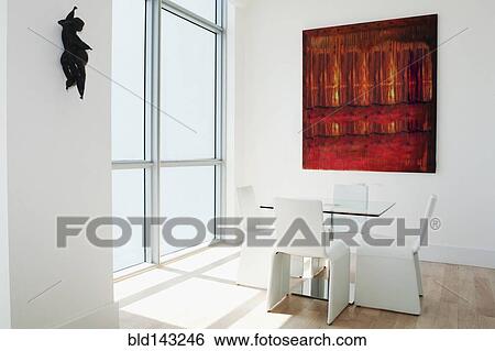 Stock Photograph - Table, chairs and windows in modern dining room. Fotosearch