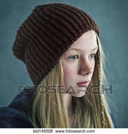 Teenage girl wearing knitted cap View Large Photo Image Stock Photograph - Teenage girl wearing knitted cap. Fotosearch