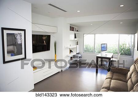 Television, sofa and windows in modern living room View Large Photo Image Stock Image - Television, sofa and windows in modern living room. Fotosearch