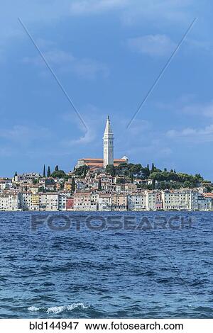 Tower and coastal village on ocean, Rovinj, Istria, Croatia View Large Photo Image Stock Photo - Tower and coastal village on ocean, Rovinj, Istria, Croatia. Fotosearch