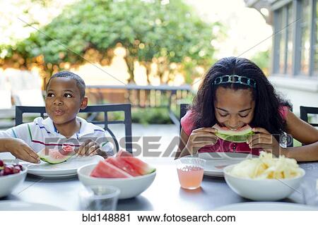 African American children eating lunch on patio View Large Photo Image Stock Image - African American children eating lunch on patio. Fotosearch