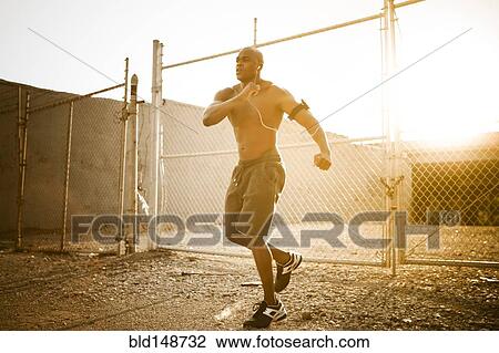 African American man exercising with mp3 player View Large Photo Image Stock Image - African American man exercising with mp3 player. Fotosearch