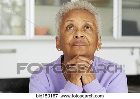 African American woman praying View Large Photo Image Stock Photo - African American woman praying. Fotosearch