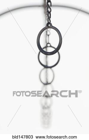 Athletic rings hanging in a row View Large Photo Image Stock Image - Athletic rings hanging in a row. Fotosearch
