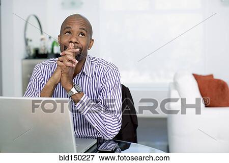 Black businessman thinking View Large Photo Image Stock Photo - Black businessman thinking. Fotosearch