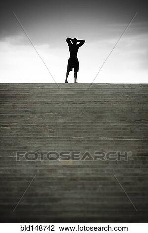 Black man stopping at top of stairs View Large Photo Image Stock Image - Black man stopping at top of stairs. Fotosearch