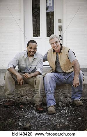 Carpenters sitting on front stoop View Large Photo Image Stock Image - Carpenters sitting on front stoop. Fotosearch