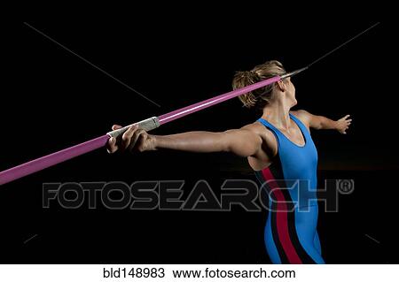 Caucasian athlete aiming javelin View Large Photo Image Stock Image - Caucasian athlete aiming javelin. Fotosearch