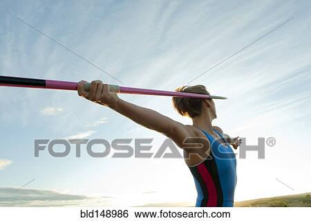 Caucasian athlete aiming javelin View Large Photo Image Stock Photograph - Caucasian athlete aiming javelin. Fotosearch