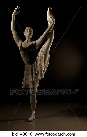 Caucasian ballerina dancing on stage View Large Photo Image Stock Photograph - Caucasian ballerina dancing on stage. Fotosearch