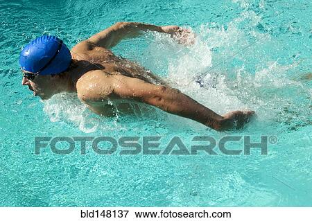 Caucasian swimmer training in swimming pool View Large Photo Image Stock Photo - Caucasian swimmer training in swimming pool. Fotosearch