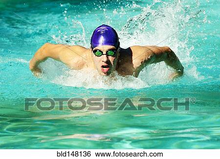 Caucasian swimmer training in swimming pool View Large Photo Image Stock Photograph - Caucasian swimmer training in swimming pool. Fotosearch