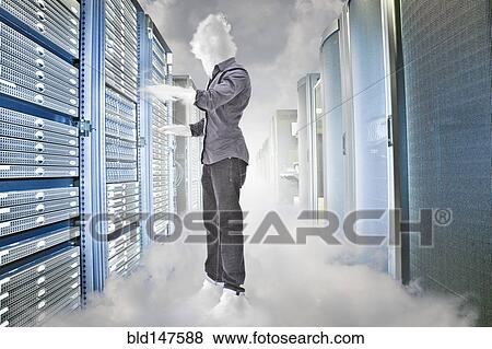 Stock Photo - Cloud business person working in server room. Fotosearch