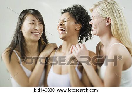 Friends laughing together View Large Photo Image Stock Image - Friends laughing together. Fotosearch