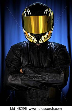 Hispanic biker in leather and reflective helmet View Large Photo Image Stock Photograph - Hispanic biker in leather and reflective helmet. Fotosearch