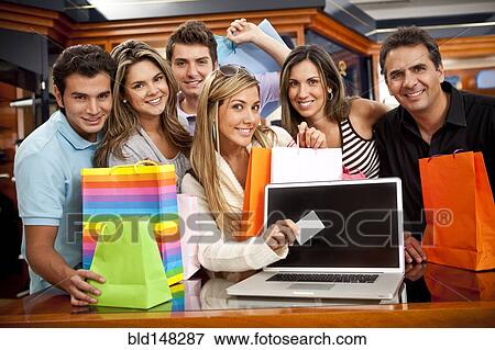 Hispanic friends shopping together View Large Photo Image Stock Photo - Hispanic friends shopping together. Fotosearch
