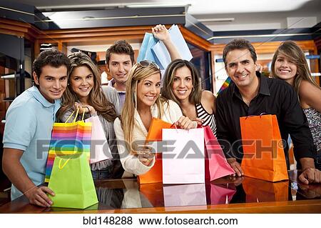 Hispanic friends shopping together View Large Photo Image Stock Photo - Hispanic friends shopping together. Fotosearch