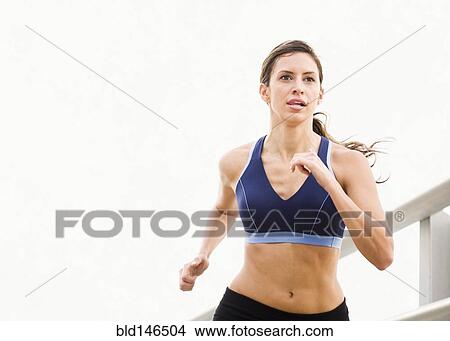 Hispanic woman running View Large Photo Image Picture - Hispanic woman running. Fotosearch