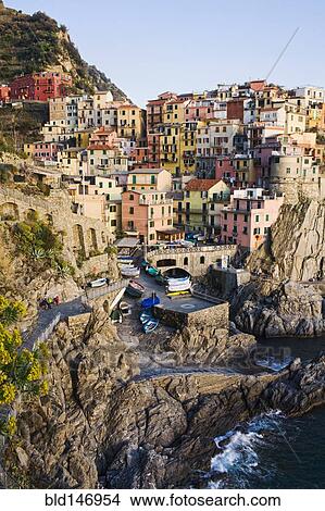 Houses on cliff face near ocean View Large Photo Image Picture - Houses on cliff face near ocean. Fotosearch