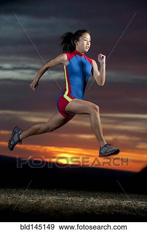 Japanese runner running at sunset View Large Photo Image Stock Photo - Japanese runner running at sunset. Fotosearch