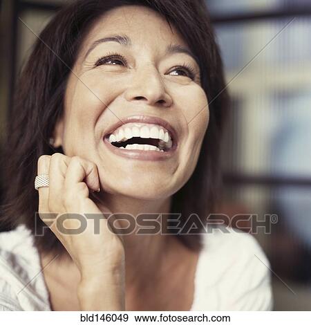 Laughing Asian woman View Large Photo Image Stock Photo - Laughing Asian woman. Fotosearch