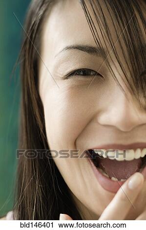 Laughing Chinese woman View Large Photo Image Stock Image - Laughing Chinese woman. Fotosearch