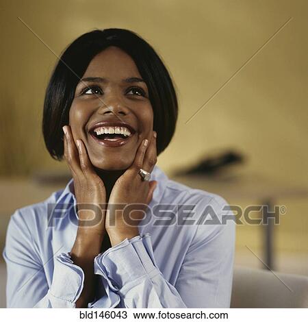 Stock Image - Laughing woman. Fotosearch