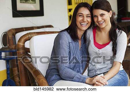 Mother and daughter laughing View Large Photo Image Stock Image - Mother and daughter laughing. Fotosearch