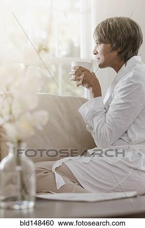 Native American woman drinking coffee View Large Photo Image Stock Image - Native American woman drinking coffee. Fotosearch