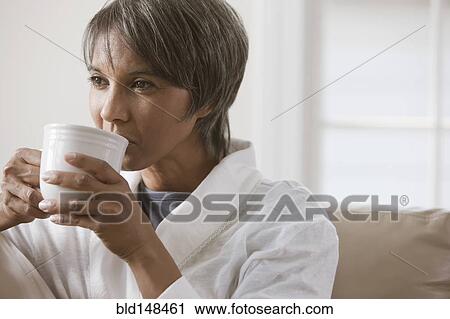 Native American woman drinking coffee View Large Photo Image Stock Image - Native American woman drinking coffee. Fotosearch