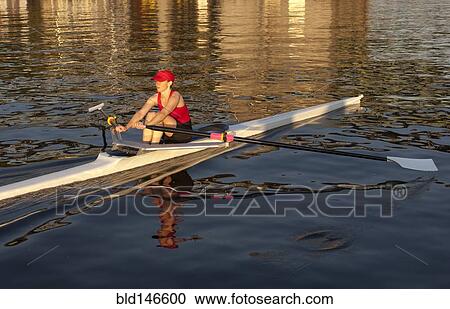 Person rowing sculling boat on river View Large Photo Image Stock Image - Person rowing sculling boat on river. Fotosearch