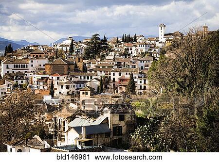 Quaint town on hillside View Large Photo Image Stock Image - Quaint town on hillside. Fotosearch