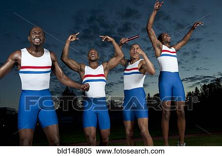 Relay race teammates cheering View Large Photo Image Stock Photography - Relay race teammates cheering. Fotosearch