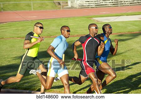 Relay racers running on track in race View Large Photo Image Stock Image - Relay racers running on track in race. Fotosearch