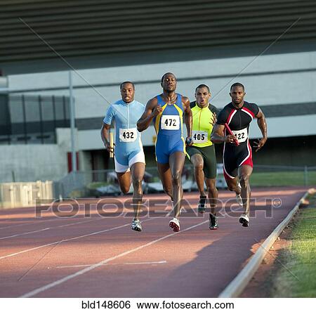 Relay racers running on track in race View Large Photo Image Stock Photograph - Relay racers running on track in race. Fotosearch