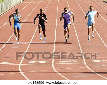 Stock Photograph - Runners running on track in race. Fotosearch