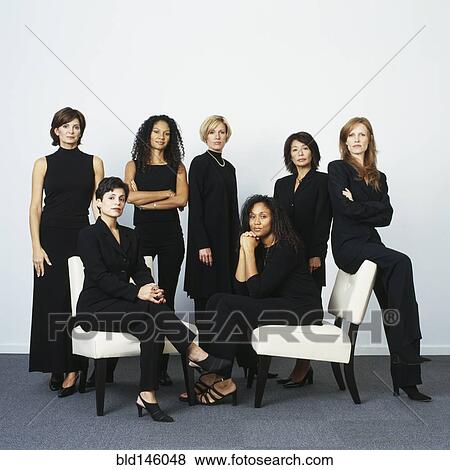Stock Photo - Serious businesswomen dressed in black. Fotosearch